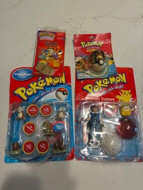 Vintage Collection of 4 POKE’MON Sealed Pkg. Collectibles